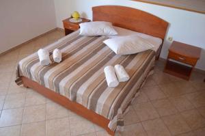 Postel nebo postele na pokoji v ubytování Apartment Palit 1