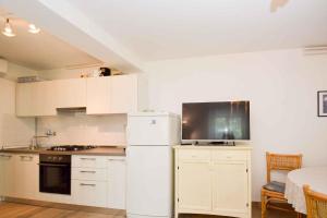 Kuchyňa alebo kuchynka v ubytovaní Pula Apartment 5