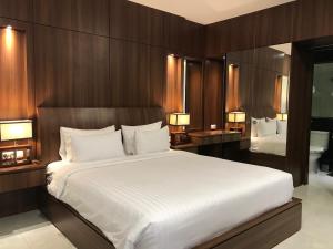 Tempat tidur dalam kamar di Rozelle by d'best hospitality
