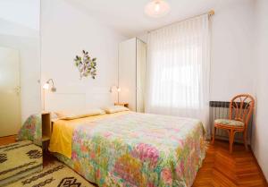 Postel nebo postele na pokoji v ubytování Apartment Pula 45