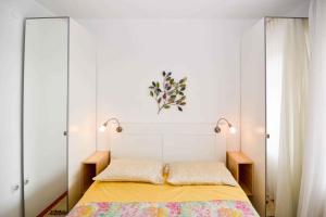 Postel nebo postele na pokoji v ubytování Apartment Pula 45 + 21 fotografií