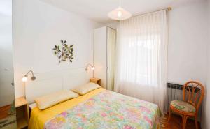 Postel nebo postele na pokoji v ubytování Apartment Pula 45