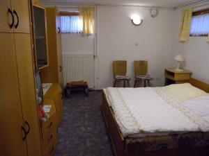 Posteľ alebo postele v izbe v ubytovaní Apartment Balatonbereny 1 + 5 fotografií