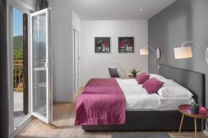 Posteľ alebo postele v izbe v ubytovaní Apartment Rabac 23