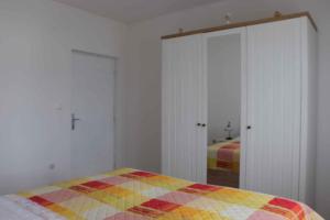 Postel nebo postele na pokoji v ubytování Apartment Slatine 6