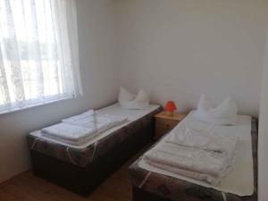 Ένα ή περισσότερα κρεβάτια σε δωμάτιο στο Holiday home Fuhlendorf 1