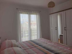 Postel nebo postele na pokoji v ubytování Apartment in Silo - Insel Krk 13496