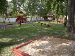 un parque con un montón de equipos de juegos en Apartment in Balatonbereny/Balaton 18075 en Balatonberény