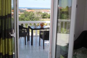 Balkón nebo terasa v ubytování Apartment Povljana 3