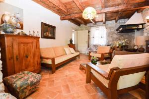 a living room with a couch and a table at Holiday home in Liznjan/Istrien 8962 in Ližnjan