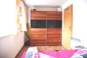 Katil atau katil-katil dalam bilik di Holiday home Ummanz 1