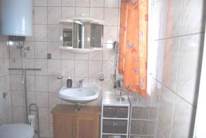 Ένα μπάνιο στο Apartment Ummanz 1 +7 φωτογραφίες