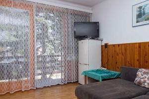 Μια τηλεόραση ή/και κέντρο ψυχαγωγίας στο Apartment in Balatonbereny - Balaton 18050 +18 φωτογραφίες