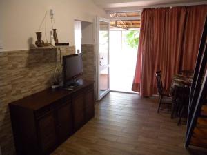 Televízia a/alebo spoločenská miestnosť v ubytovaní Apartment Balatonfenyves - Balaton 18390