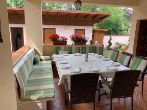 a table and chairs sitting on a patio at Apartment in Siofok/Balaton 19714 in Siófok