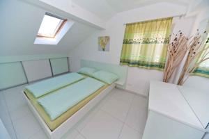 Posteľ alebo postele v izbe v ubytovaní Apartment Crikvenica, Vinodol 14