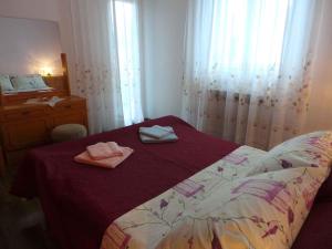 Postel nebo postele na pokoji v ubytování Apartment Lovran 15546
