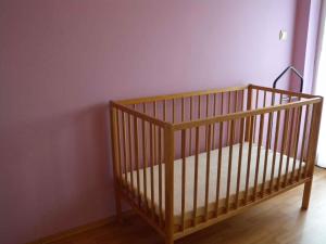 A bed or beds in a room at House and Apartment Balatonmariafürdo 19319
