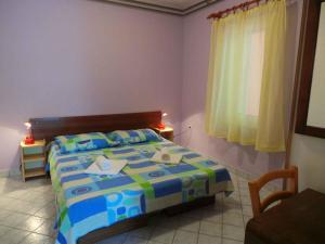 a bedroom with a bed and a window at Apartment in Labin/Istrien 8760 in Labin