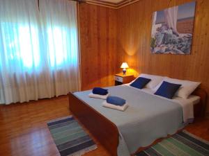 En eller flere senger på et rom på Apartment in Muntic/Istrien 10825
