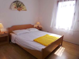 Postel nebo postele na pokoji v ubytování Holiday home in Medulin - Istrien 8949