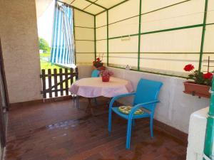 Balkón nebo terasa v ubytování Holiday home in Medulin - Istrien 8949