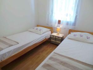 Postel nebo postele na pokoji v ubytování Holiday home in Medulin - Istrien 8949