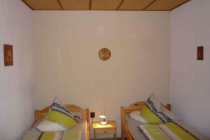 Кровать или кровати в номере Holiday home in Waltershausen OT Fischbach 3171