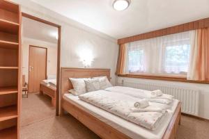 Posteľ alebo postele v izbe v ubytovaní Apartment Svoboda nad upou 2