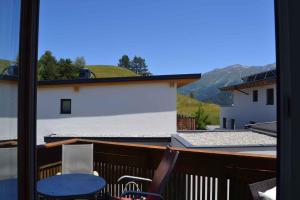 a view of a balcony with a table and chairs at Apartment in Serfaus/Ötztal 510 in Serfaus