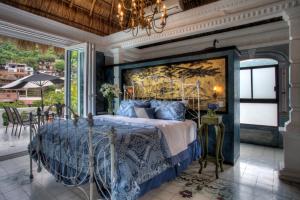 Postel nebo postele na pokoji v ubytování Hotel Boutique Rivera Del Rio + 37 fotografií