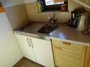 Kuchyň nebo kuchyňský kout v ubytování Apartment Strobl 2