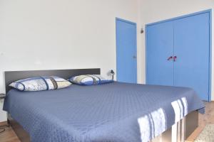 Posteľ alebo postele v izbe v ubytovaní Apartments Piero
