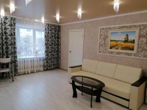 Гостиная зона в Apartment on Trekhsvyatskaya 28