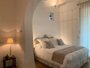 Llit o llits en una habitació de Villa Caprera