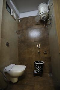 Koupelna v ubytování VIPs Hotel Olive