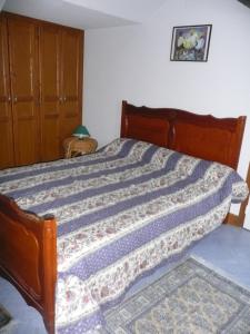 מיטה או מיטות בחדר ב-gite la chapelle