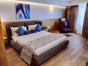 The Fern Residency, Jamnagar客房内的一张或多张床位