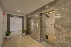 Kupaonica u objektu Shagun Hotel