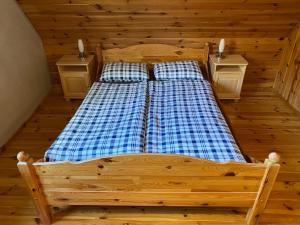 Postel nebo postele na pokoji v ubytování DOMEK 64