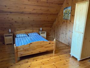 Postel nebo postele na pokoji v ubytování DOMEK 64