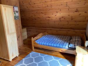 Postel nebo postele na pokoji v ubytování DOMEK 64
