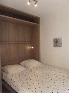 Postel nebo postele na pokoji v ubytování appartement vue mer