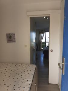 Postel nebo postele na pokoji v ubytování appartement vue mer