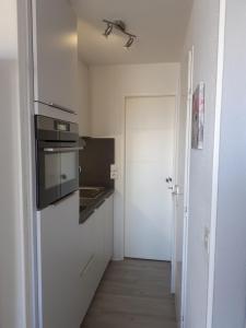 Kuchyň nebo kuchyňský kout v ubytování appartement vue mer