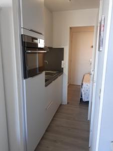 Kuchyň nebo kuchyňský kout v ubytování appartement vue mer