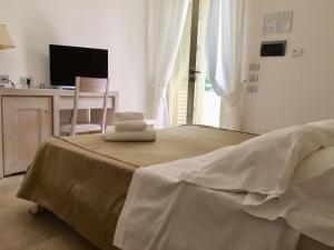 Postel nebo postele na pokoji v ubytování Hotel Alta La Vista