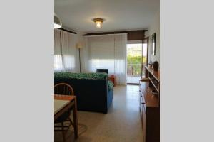 Posedenie v ubytovaní Apartamento con terraza en la playa de La Fosca