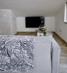 Televízia a/alebo spoločenská miestnosť v ubytovaní A Casa di Lalla