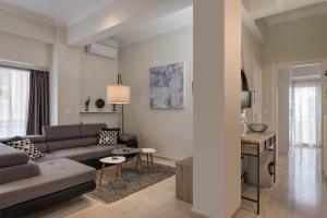 A seating area at Old Harbor Apartment Luxury Living Chania